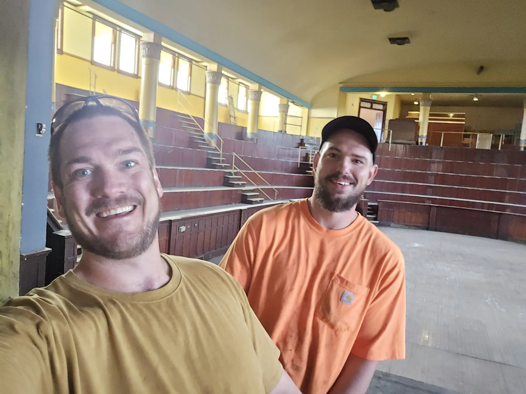 Saber and Gadge in a historic downtown building after finishing a job in spring 2026
