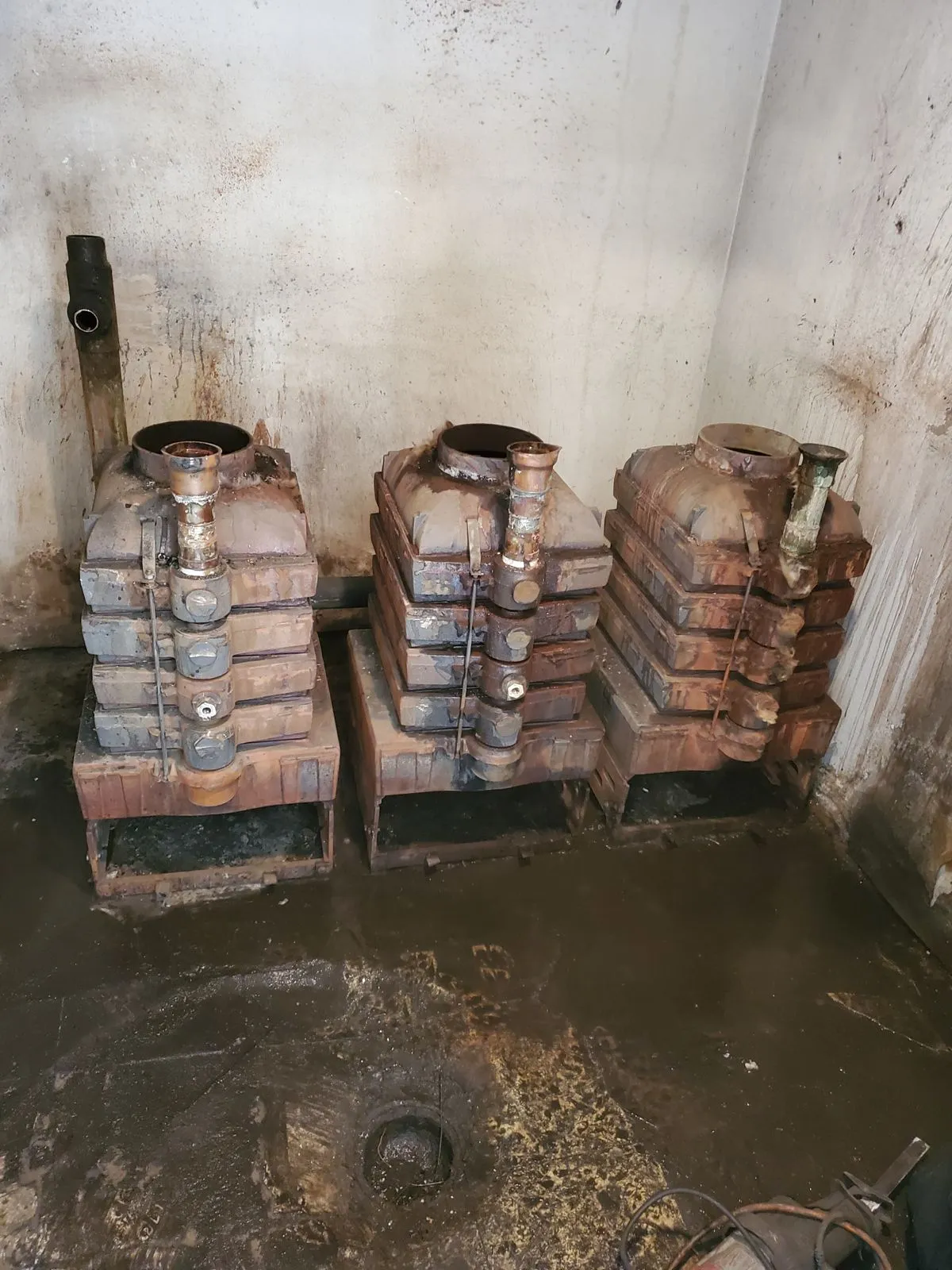 Before: Cast iron sectional, apartment building