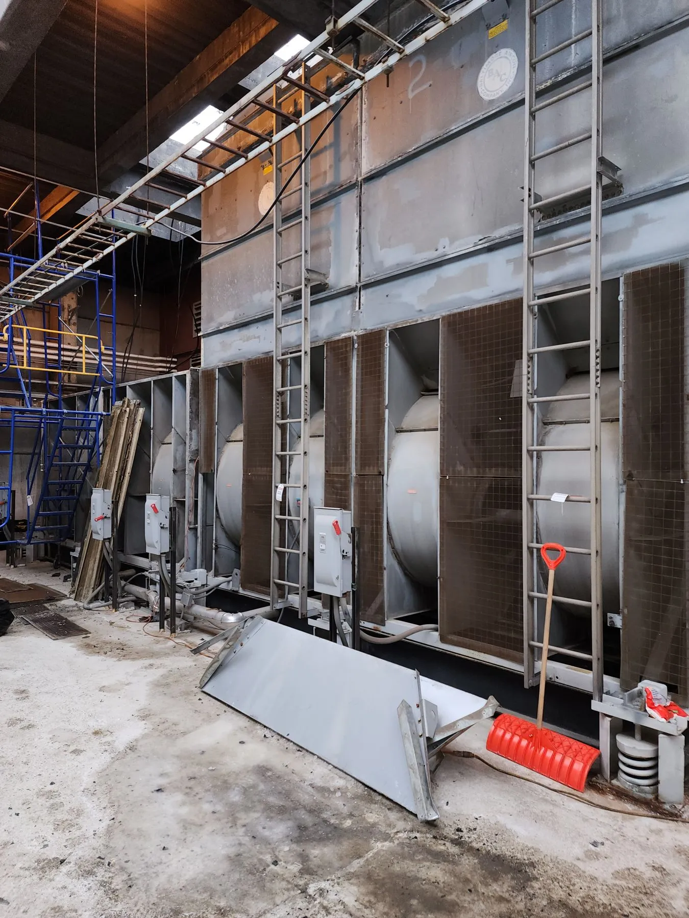 Large industrial boiler plant with scaffolding before demolition